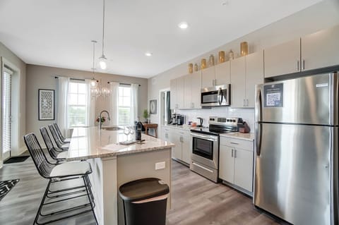 Beautiful modern kitchen with stainless steel & granite 