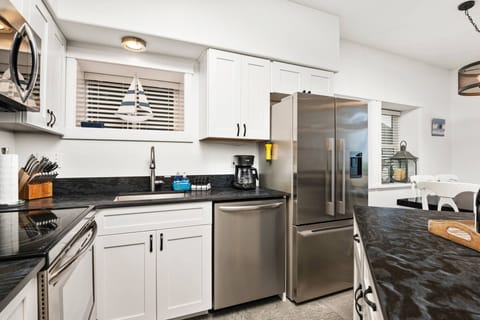 Cook delicious meals for breakfast, lunch, and dinner in this fully equipped kitchen. We suggest grabbing some seafood from a local market.