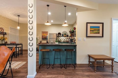 Kitchen seating on both sides of breakfast bar