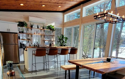 The kitchen is open, airy, and fully equiped for cooking.