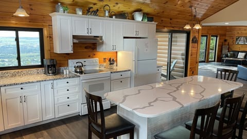 Massive kitchen island and breakfast bar. 
