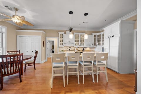 Kitchen with island seating and table