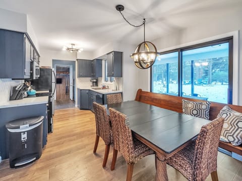 Large dining table complete w Church Pew, fits 8