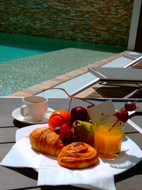 Outdoor pool, open 8:00 AM to 8:00 PM, sun loungers