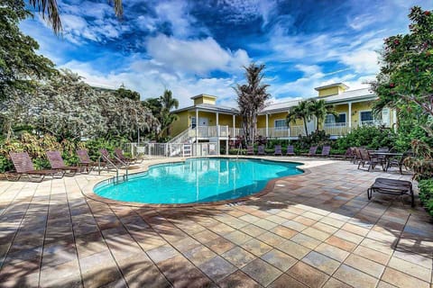 Beach Club heated pool with loungers in the sun or shade....whichever you prefer....