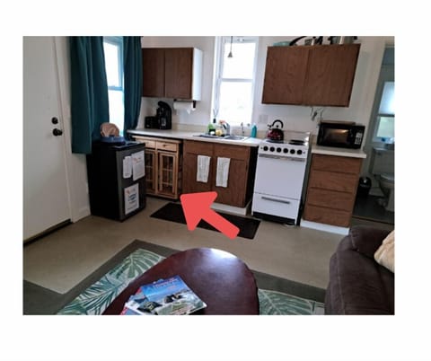 Table slides out and becomes a barstool table to eat on