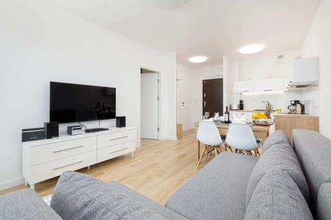 Fully equipped kitchen with sleek cabinets and appliances