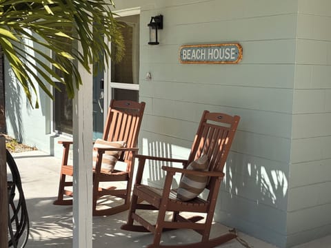 Welcome! Front porch with rocking chairs