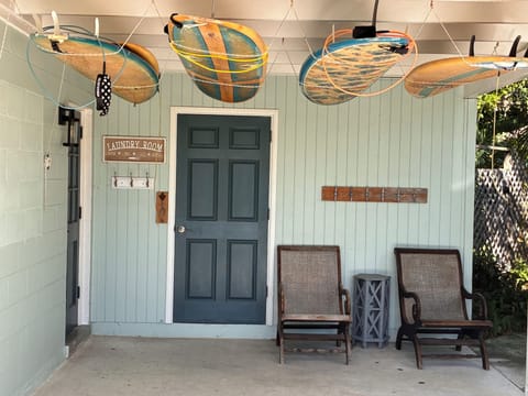 Open carport with surf boards to use
