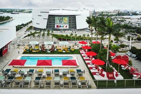 Outdoor pool, open 7:00 AM to 9:00 PM, pool umbrellas, sun loungers