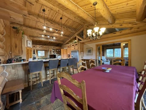 Dining table and buffet. Private office with pocket doors off the kitchen. 