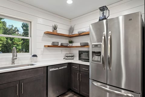 Large refrigerator with ice maker. 