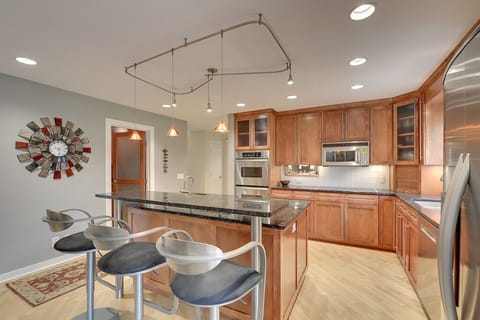Kitchen with double convection ovens. Large center island and all the cookware 