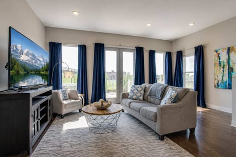 Bright, open living room perfect for relaxing, gathering, and cozy nights in.