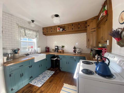 Fully stocked kitchen with everything you need to make your own meals here.