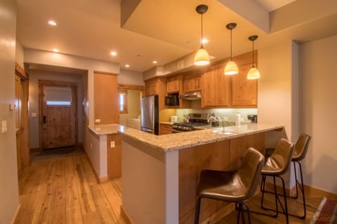 Seating for three at the breakfast bar