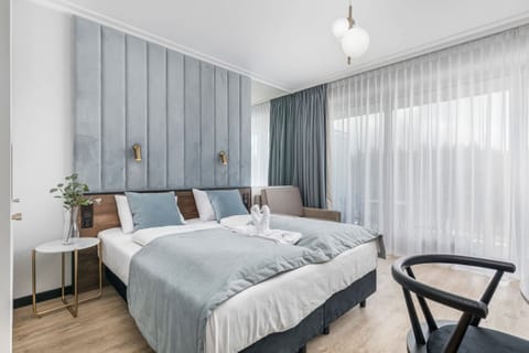 Modern bedroom with a double bed and stylish design