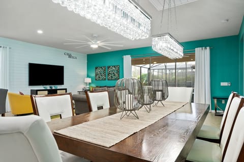 Stunning dining table with flat screen TV