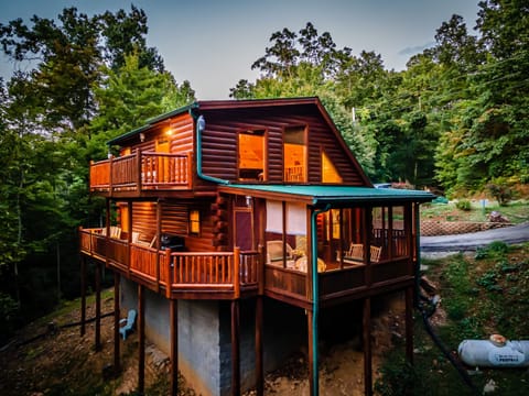 Beautiful cabin with two decks.  Covered deck now features a brand new hot tub
