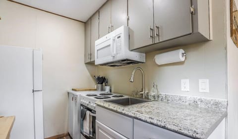 The galley kitchen provides all the necessities you'll need during your stay.