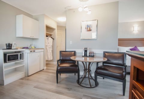 Room, 1 Queen Bed (Coast Premium Queen Suite) | Private kitchenette | Fridge, microwave, coffee/tea maker, dining tables