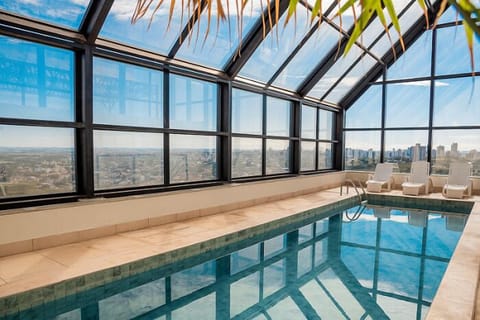 Indoor pool, open 6:00 AM to 10:00 PM, sun loungers