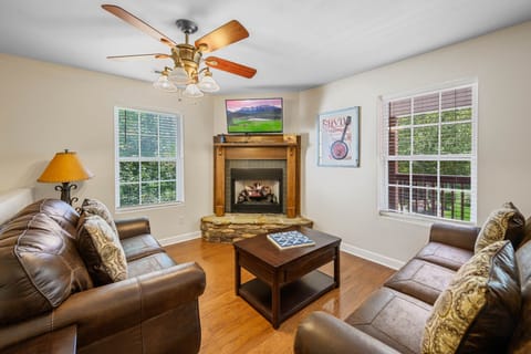 Relax in front of the fireplace and enjoy a good movie on the flatscreen TV. 