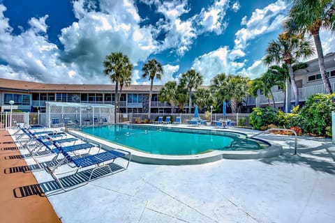Loungers arranged around the pool.  Time to work on the tan!
