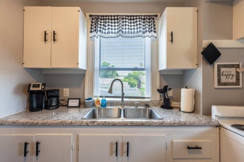 Some natural lighting coming into the kitchen. We have both a k-cup style and original style coffee makers.
