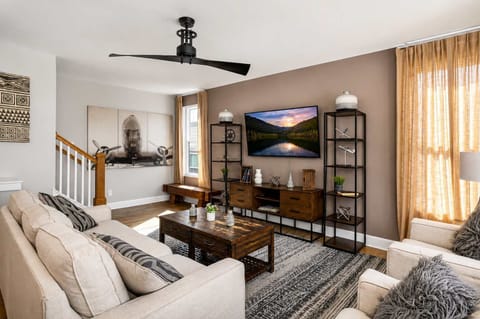 Bright, stylish living room with comfortable seating, perfect for relaxing and gathering with family and friends.