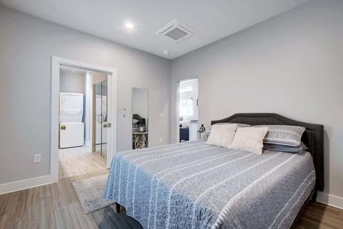 Primary bedroom with queen sized bed. 