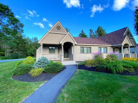 This two-bedroom condo with modern amenities—including an EV charger for your convenience—offers both comfort and location in one of New Hampshire's most picturesque settings.