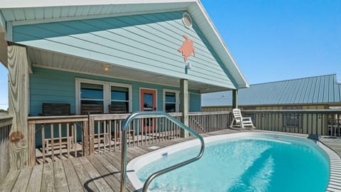 This beach property is the best choice for your next vacation with its heated pool and one minute walk to the beach!