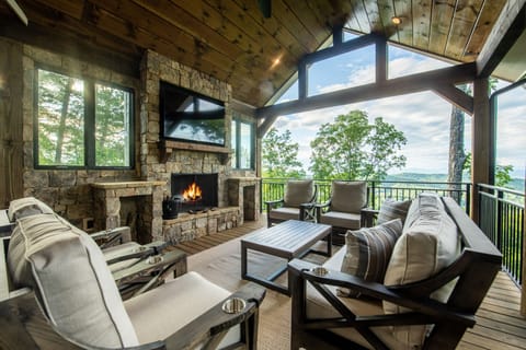 Main Level Deck with Wood Burning Fireplace and HD TV
