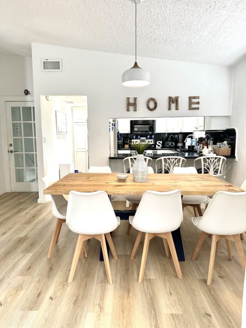 View of dining room and kitchen. 