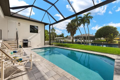 You get unobstructed views with the picture frame window in the screened in lanai