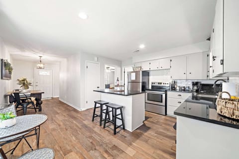 Kitchen Paradise: Modern appliances and a stylish island—perfect for family meals and gatherings.