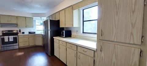 Large upstairs kitchen with distinct views.