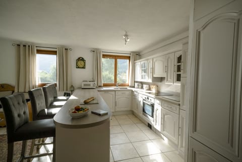 American style kitchen in open plan area with lounge.