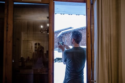 Watching the snow fall, waiting for the lifts to open.