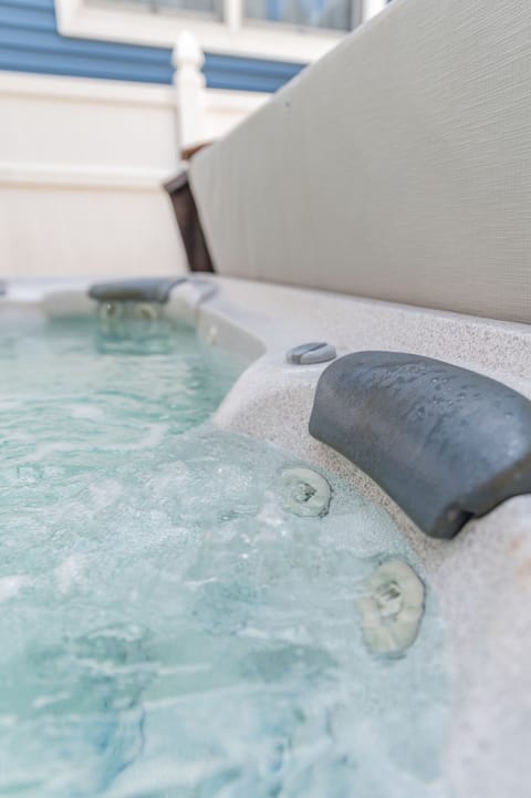 Relax in the hot tub off the back deck