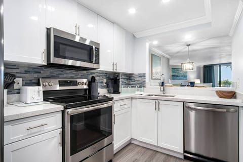 The kitchen is fully equipped and ready for any meal or cocktail endeavor.