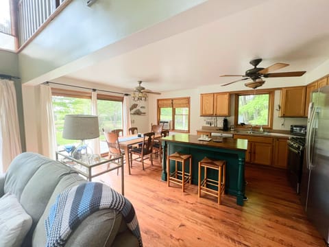 Kitchen/dining area with access to outdoor deck. - Kitchen/dining area with access to outdoor deck.