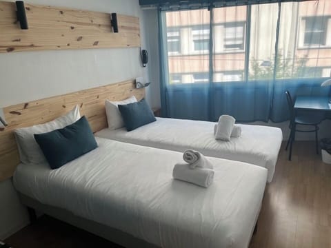 Room, 2 Twin Beds (POP Room) | Desk, soundproofing, free WiFi, bed sheets