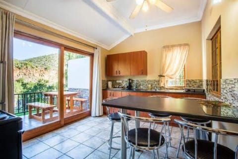 Family Apartment | Private kitchen | Full-size fridge, coffee/tea maker, electric kettle, cleaning supplies