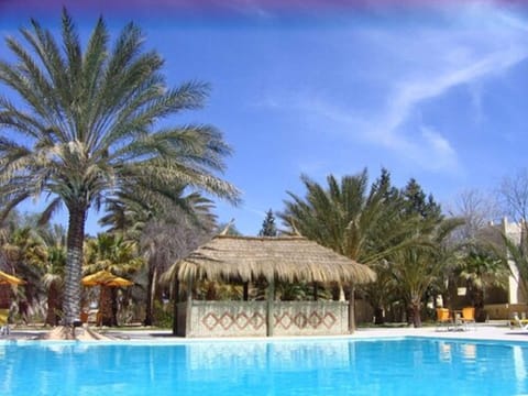 Indoor pool, outdoor pool, pool umbrellas, sun loungers