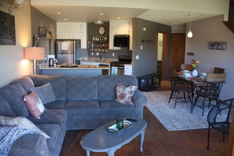 Open concept kitchen, dining room, and living room