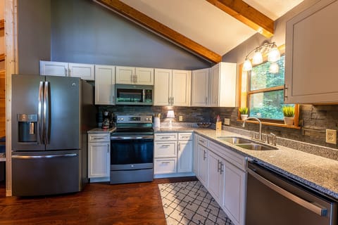 Mountain Oasis Cabin Rental - Living Room with Fully Equipped Kitchen