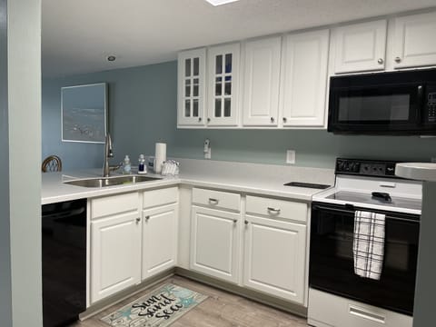 Updated kitchen with Corian countertops and new dishwasher