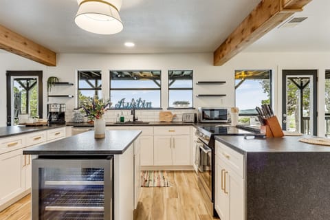 Cook up a storm in this beautifully designed and well-lit kitchen.